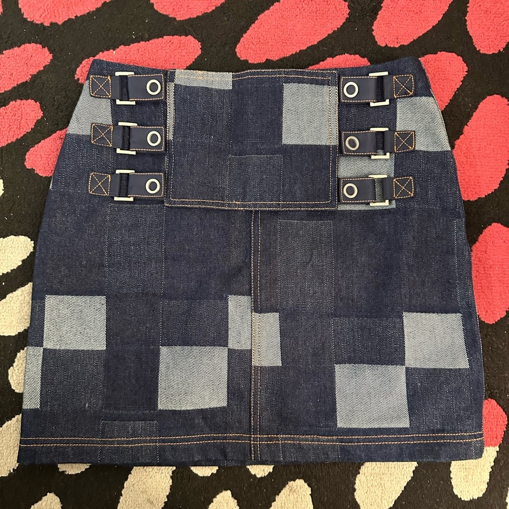 Opening ceremony patchwork denim skirt with button closures. Size 2